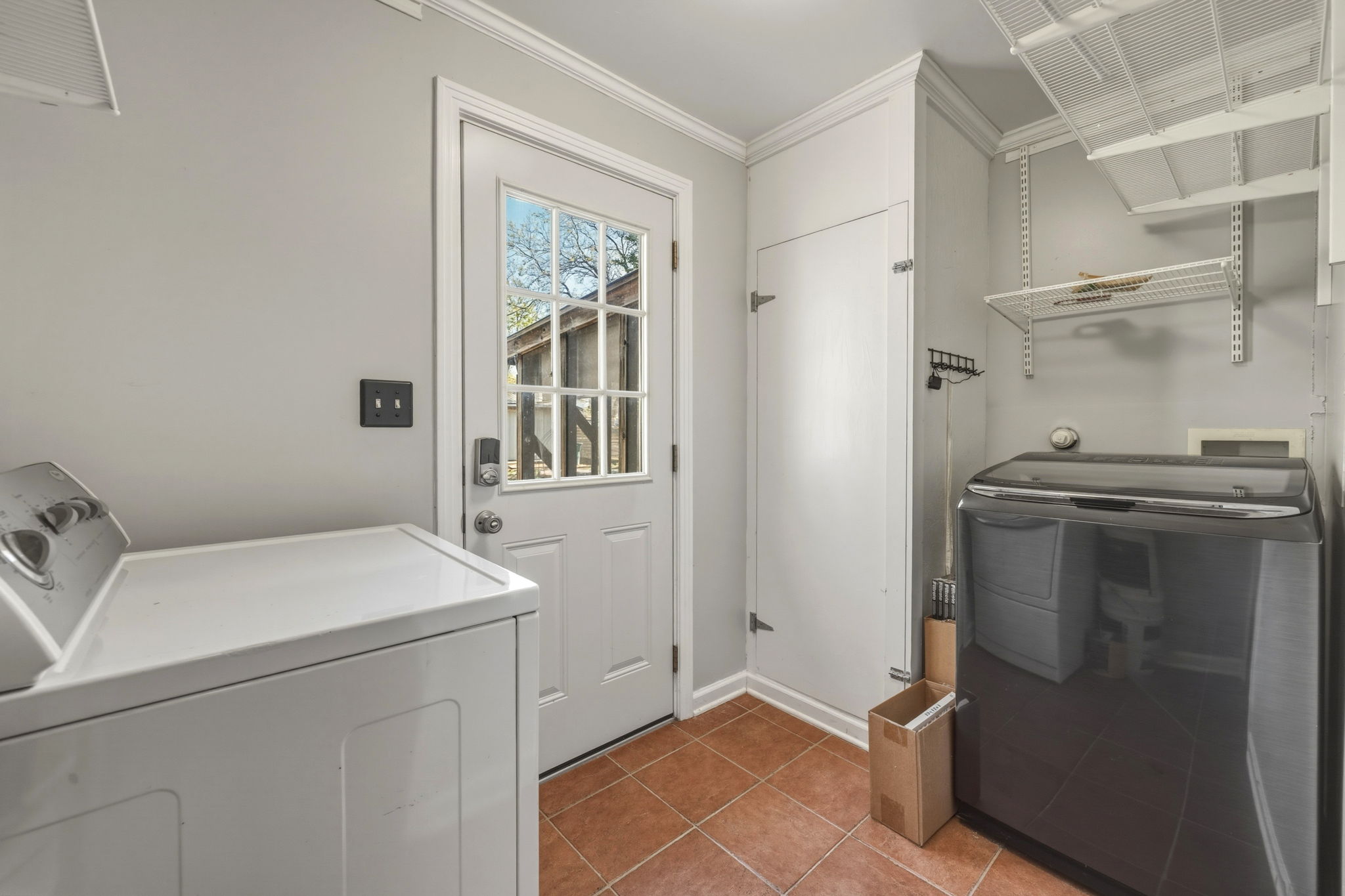 1908 Cullen Avenue Austin, TX 78757 - Photo 17 of 40 a utility room with dryer and washer