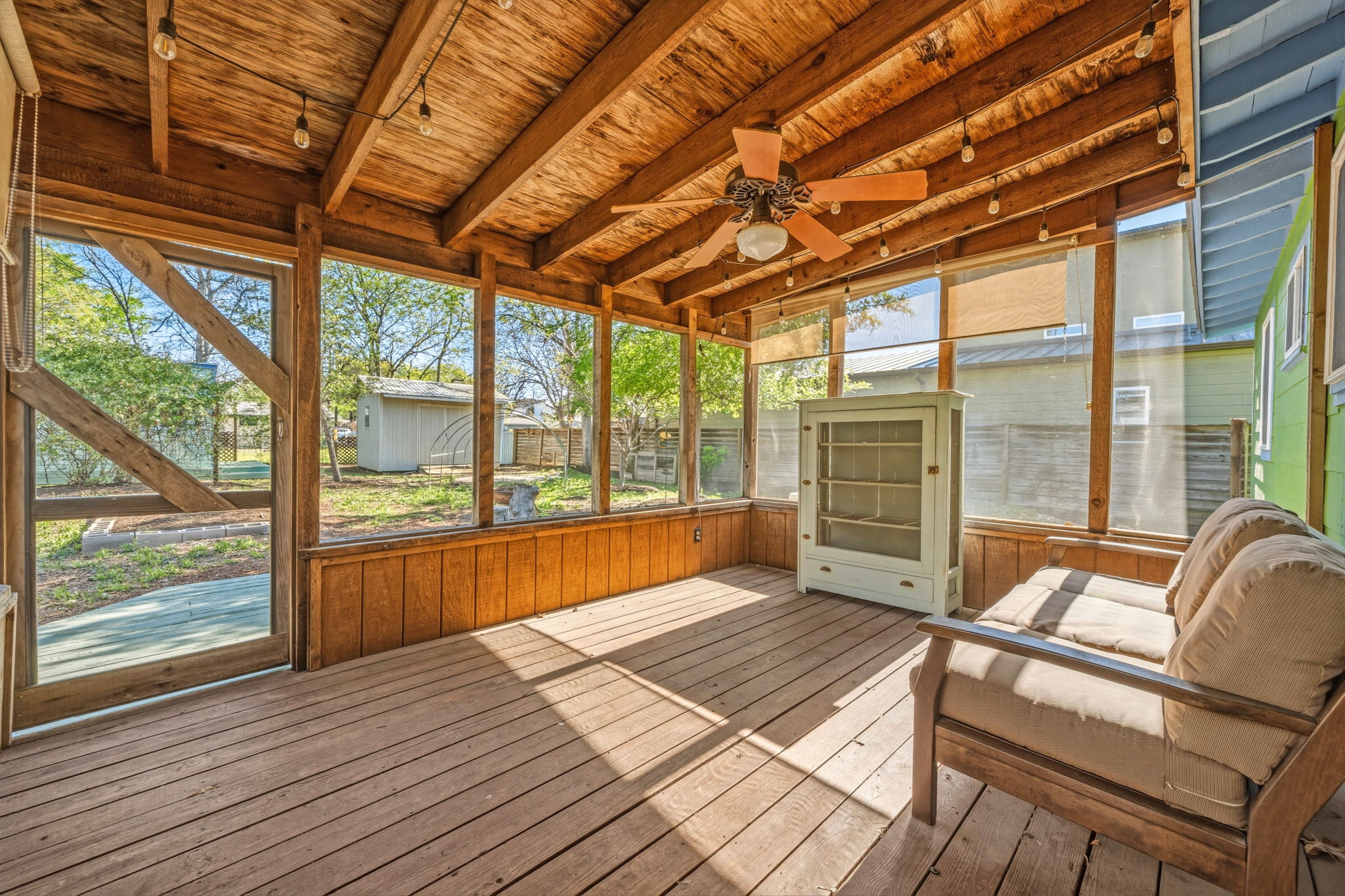 1908 Cullen Avenue Austin, TX 78757 - Photo 19 of 40 a bedroom with furniture and large windows