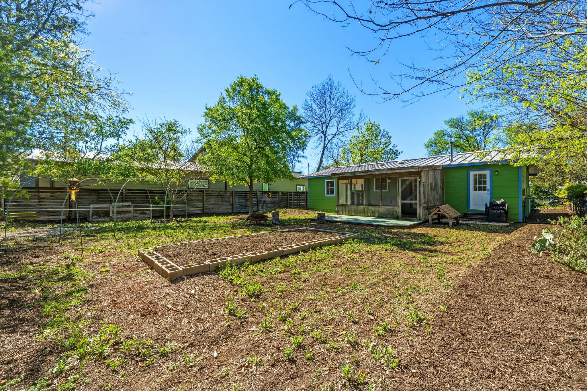 1908 Cullen Avenue Austin, TX 78757 - Photo 23 of 40 a view of a house with backyard and a tree