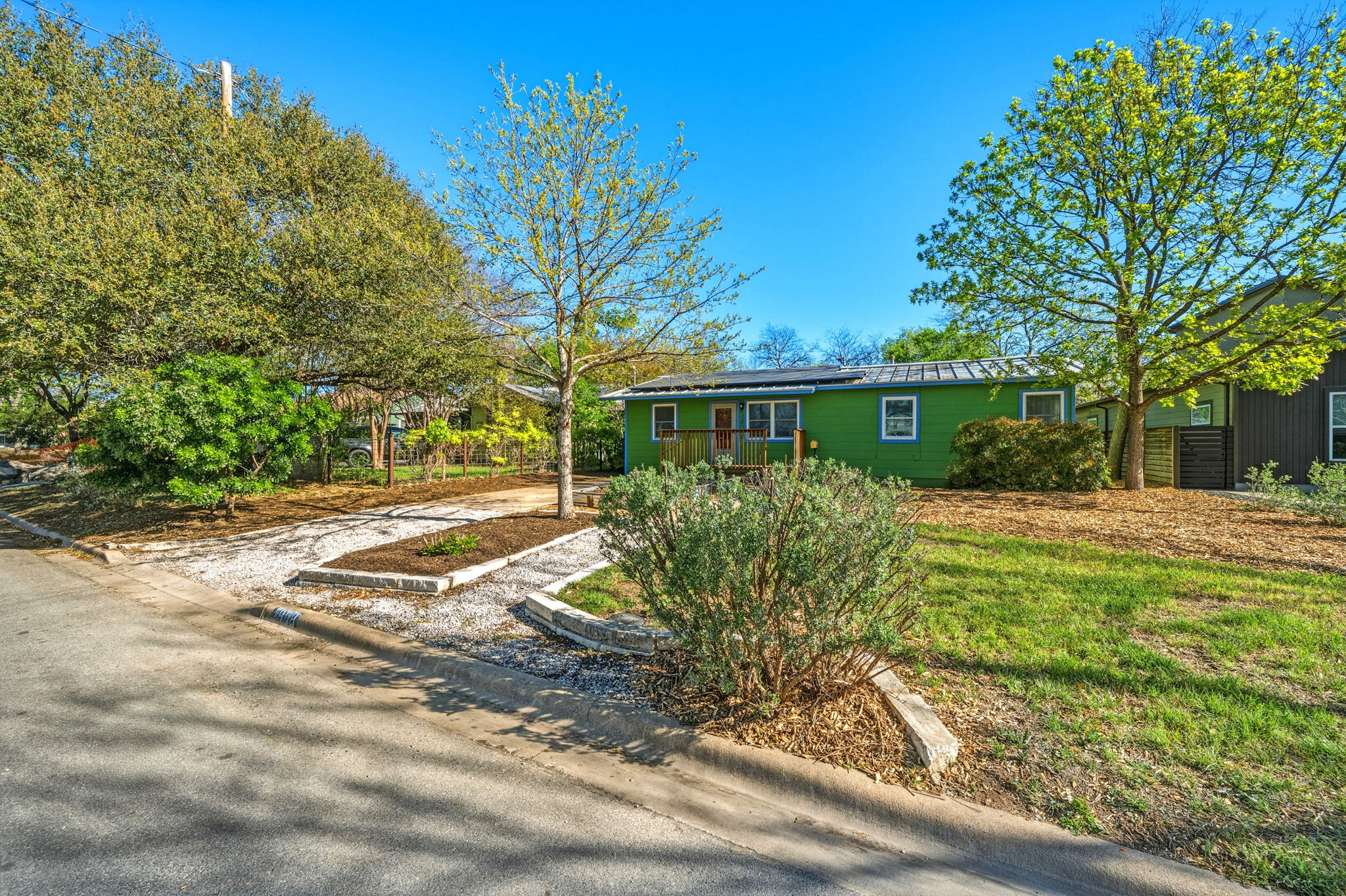 1908 Cullen Avenue Austin, TX 78757 - Photo 35 of 40 a view of a yard with plants and large trees