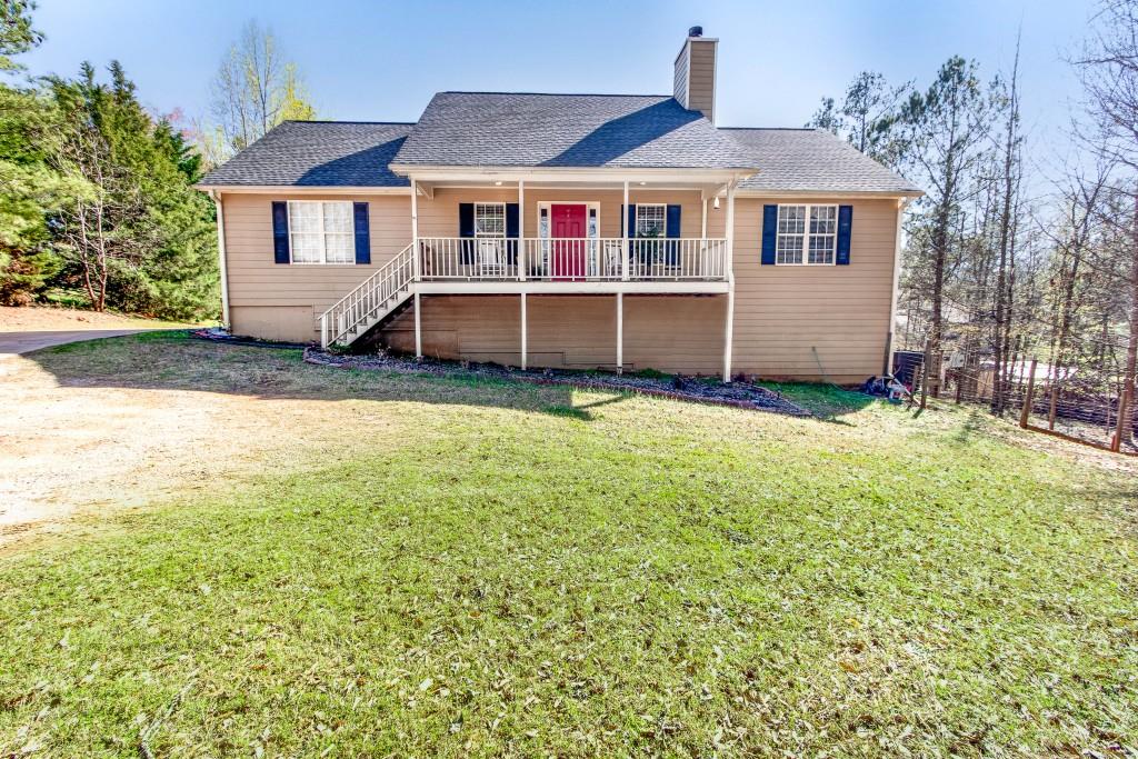 1563 Roscoe Davis Road Monroe, GA 30656 - Photo 1 of 1 front view of a house with a yard