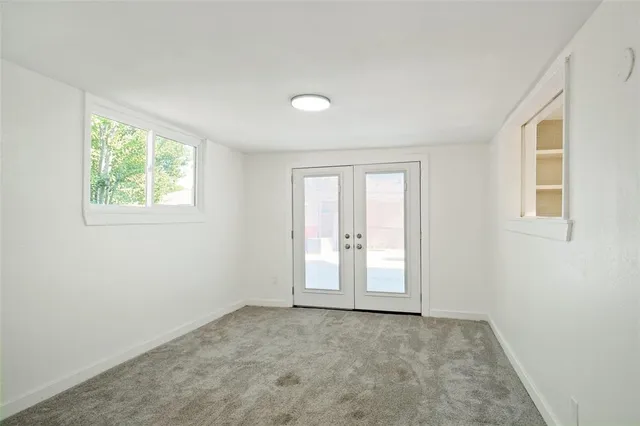 an empty room with windows