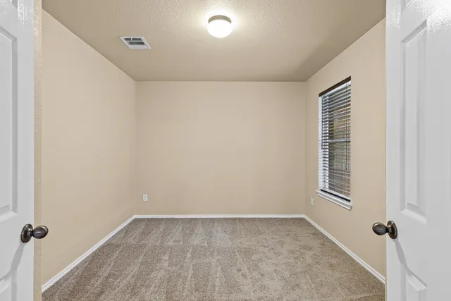 a view of a room with windows