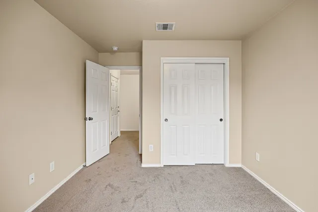 a bathroom with a sink toilet a mirror and shower