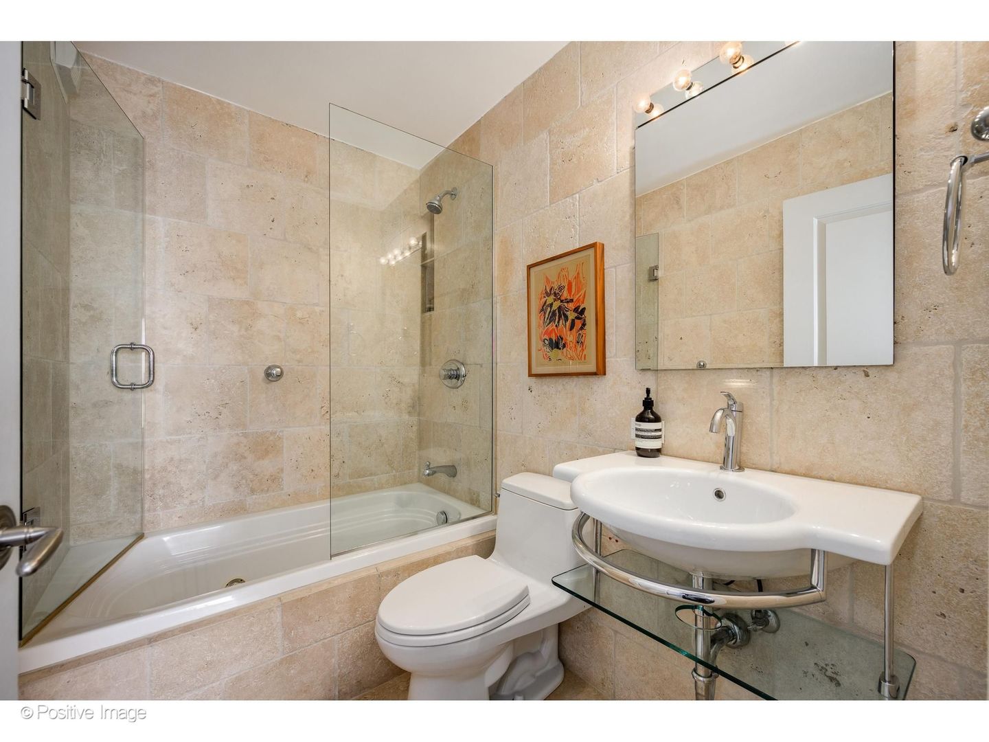 1310 North Ritchie Court, Unit 26C Chicago, IL 60610 - Photo 23 of 34 a bathroom with a sink toilet a mirror and shower