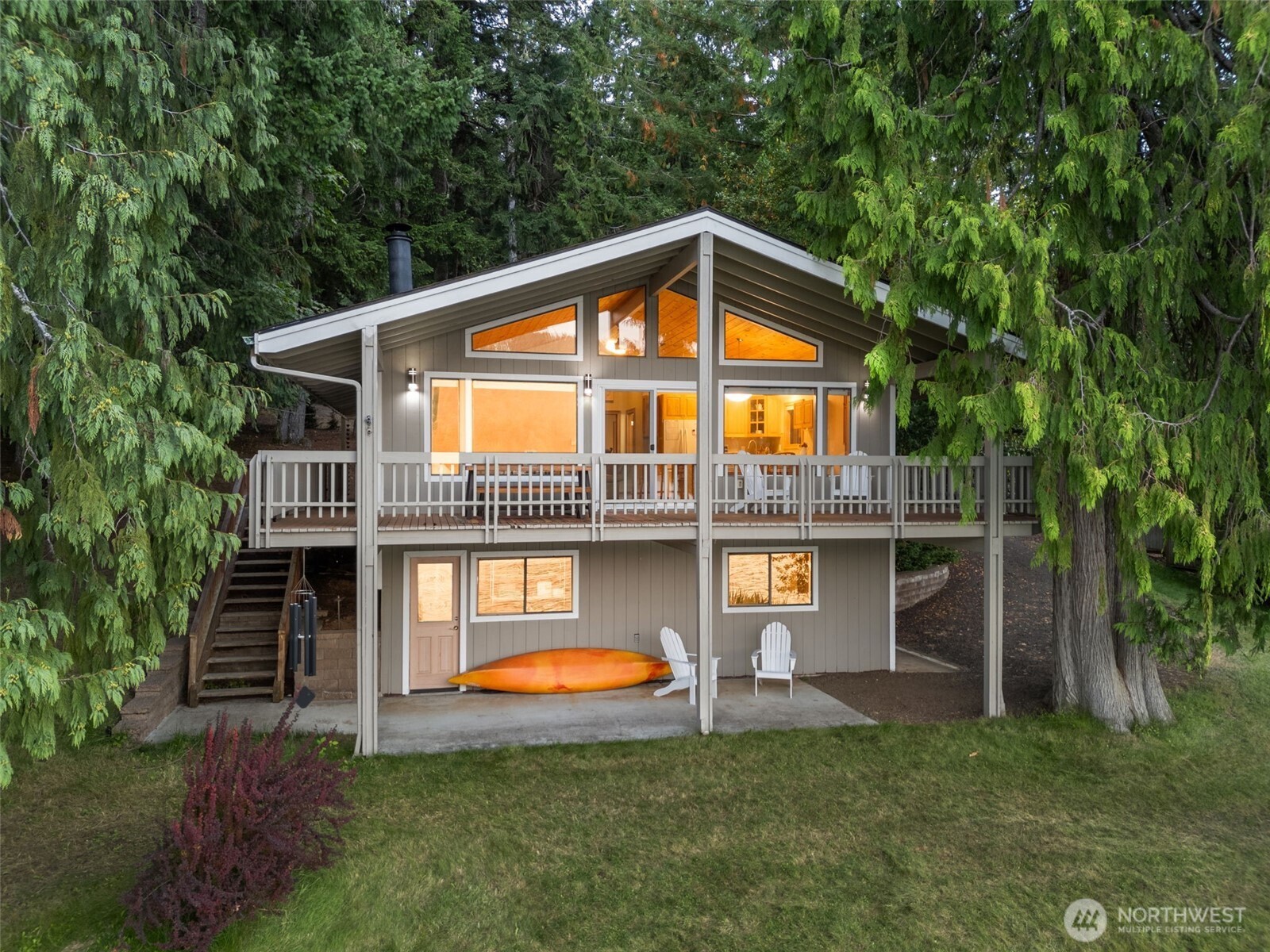 2147 Summit Lake Shore Road Northwest Olympia, WA 98502 - Photo 2 of 38 a front view of a house with a yard