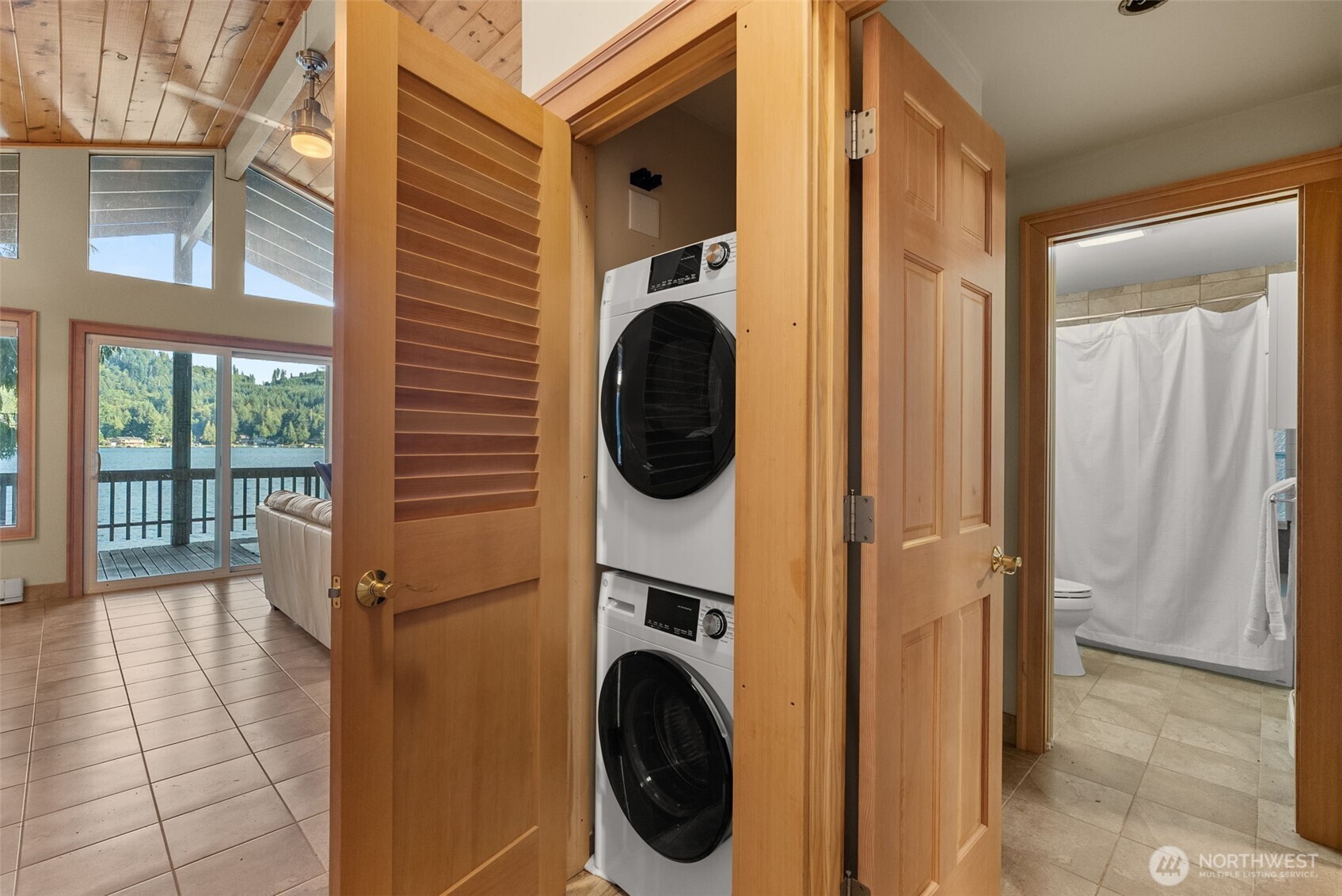2147 Summit Lake Shore Road Northwest Olympia, WA 98502 - Photo 27 of 38 a view of a hallway with washer and dryer