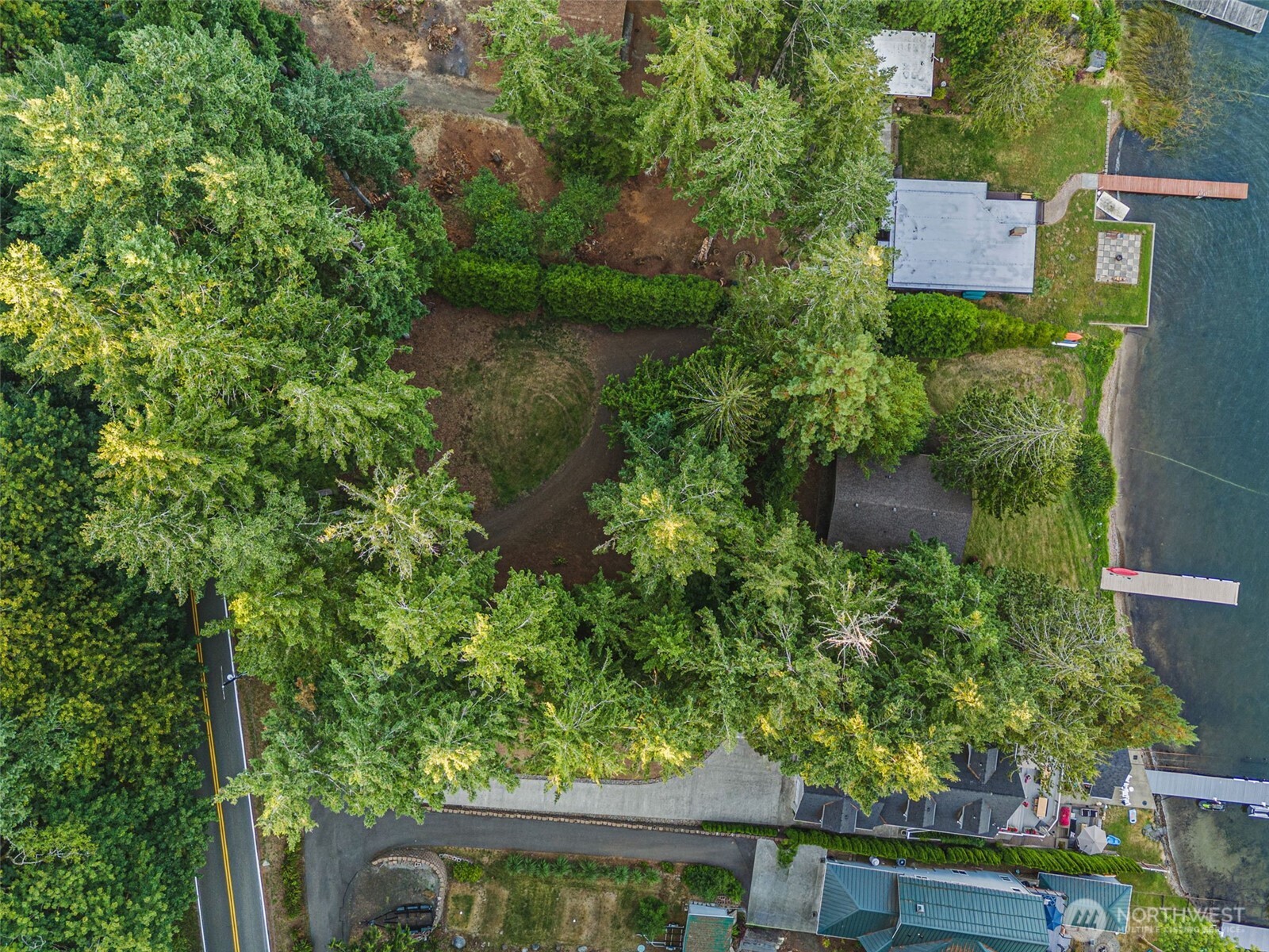 2147 Summit Lake Shore Road Northwest Olympia, WA 98502 - Photo 35 of 38 an aerial view of a house with a yard