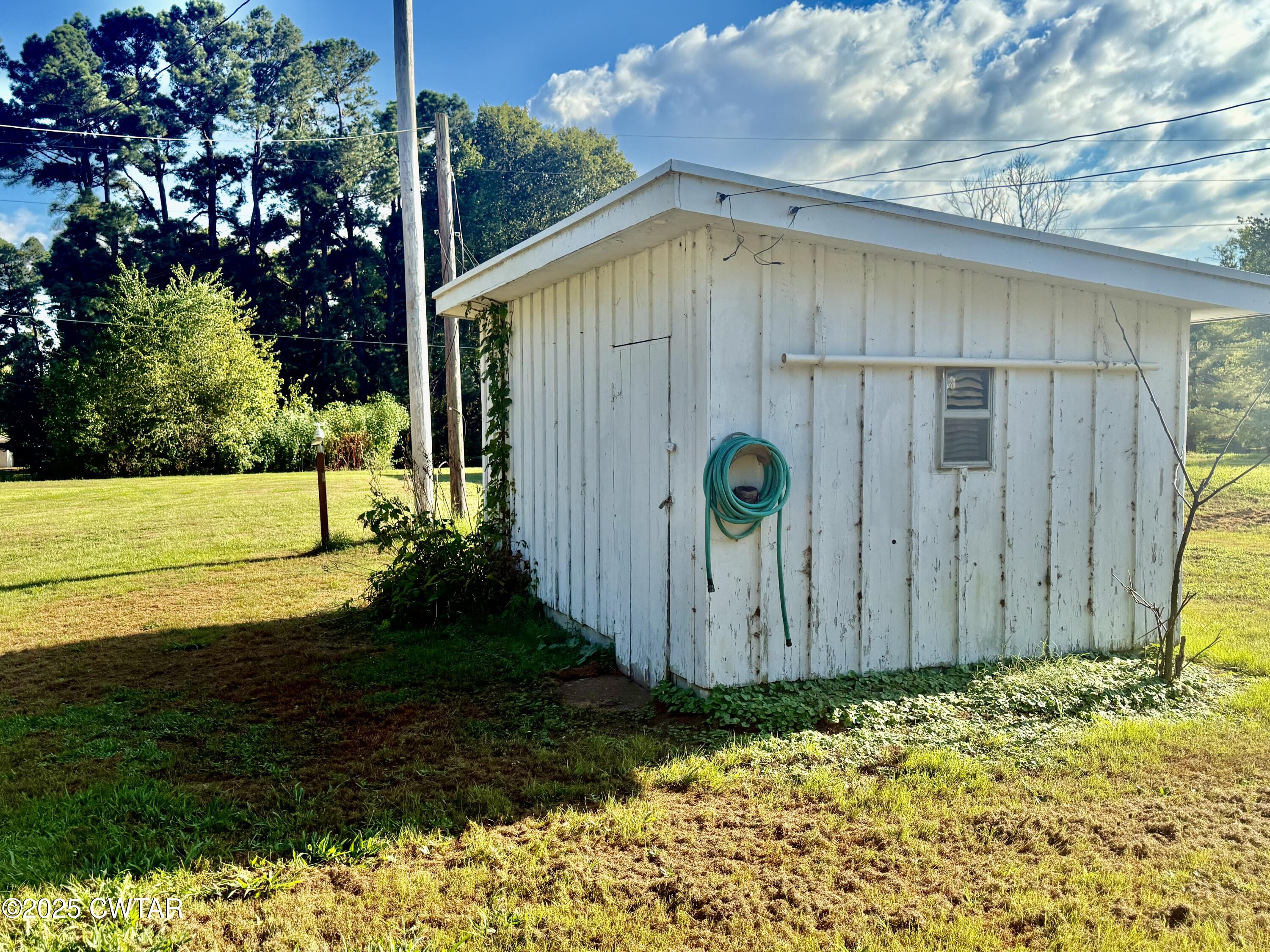 5021 McClard Road Union City, TN 38261 - Photo 20 of 21 a backyard of a house