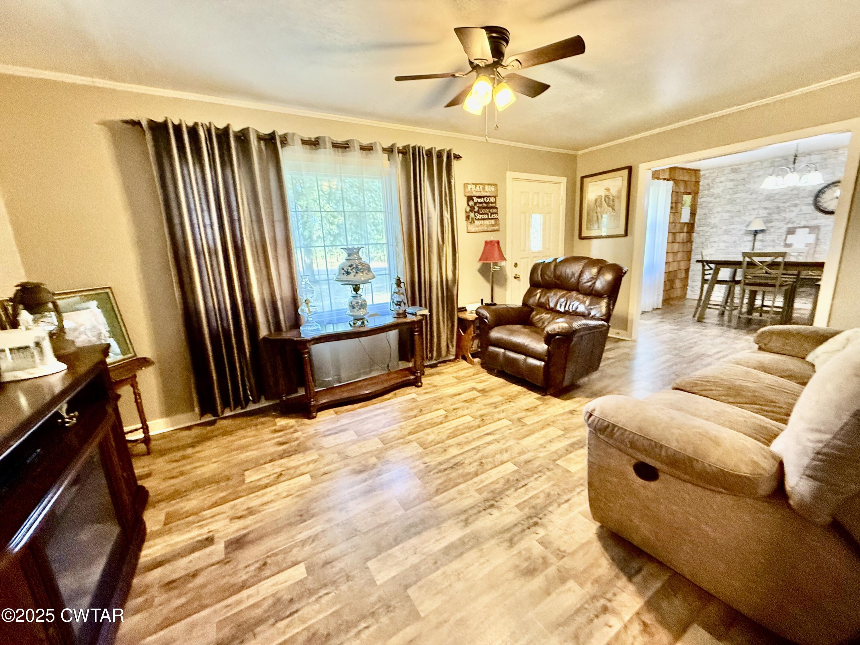 5021 McClard Road Union City, TN 38261 - Photo 3 of 21 a living room with furniture and a flat screen tv