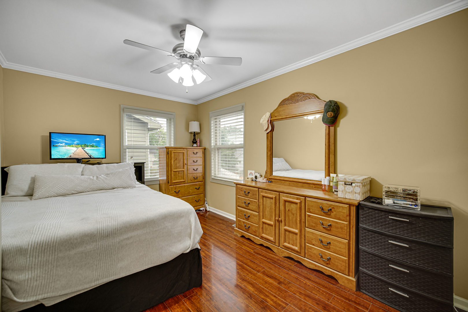 807 Summit Avenue Wauconda, IL 60084 - Photo 18 of 25 a bedroom with a bed and dresser with mirror