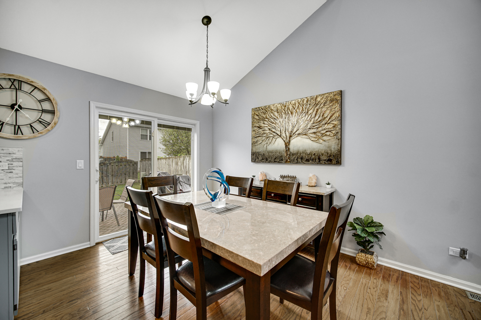 807 Summit Avenue Wauconda, IL 60084 - Photo 7 of 25 a view of a dining room with furniture wooden floor and a chandelier
