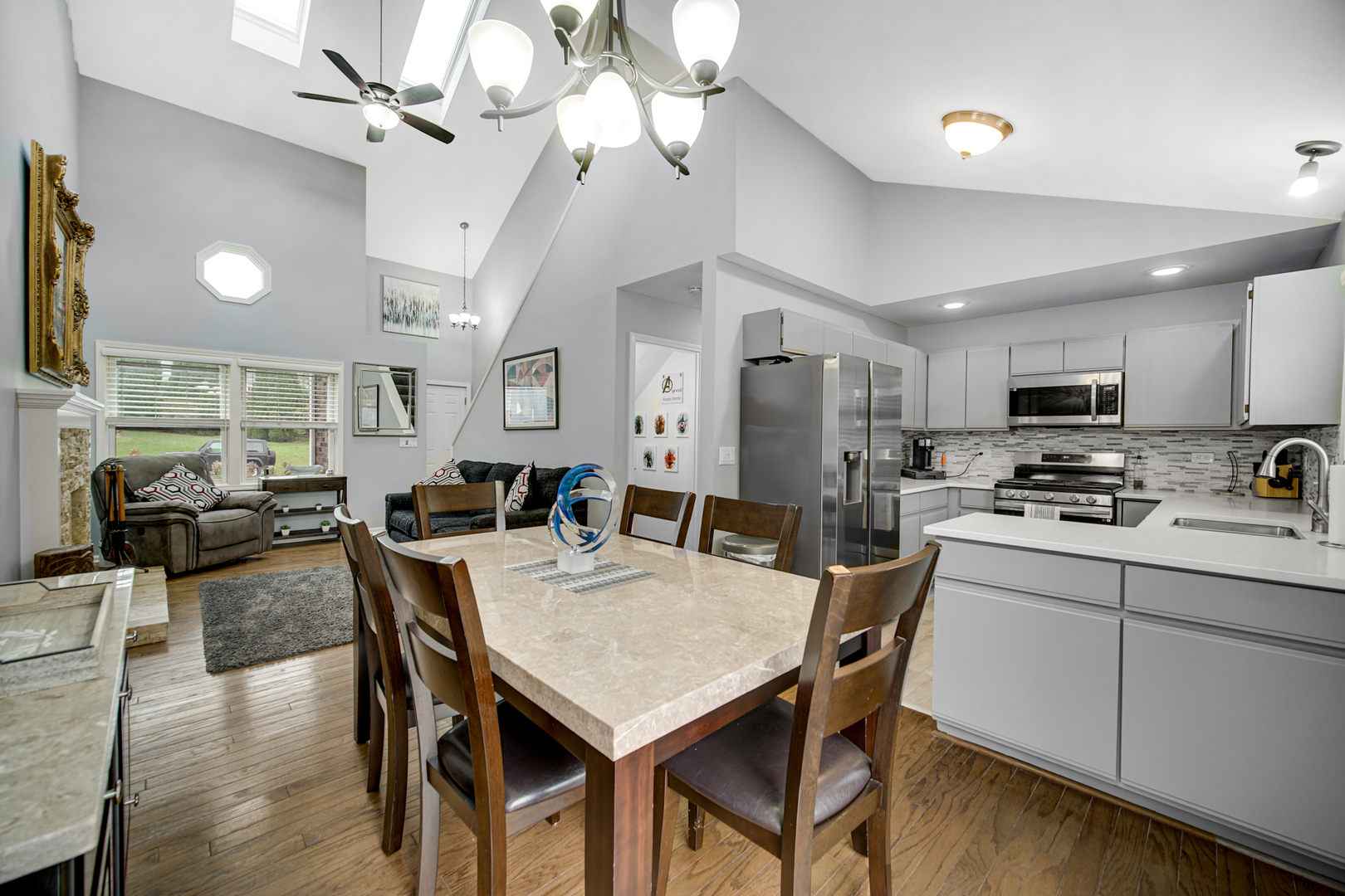 807 Summit Avenue Wauconda, IL 60084 - Photo 8 of 25 a view of kitchen with cabinets table and chairs
