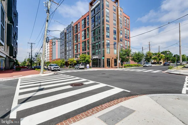a view of a building with a street