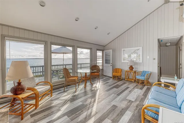 a living room with furniture and a table