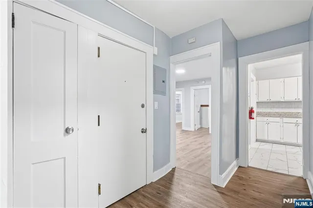 a view of a bathroom with wooden floor