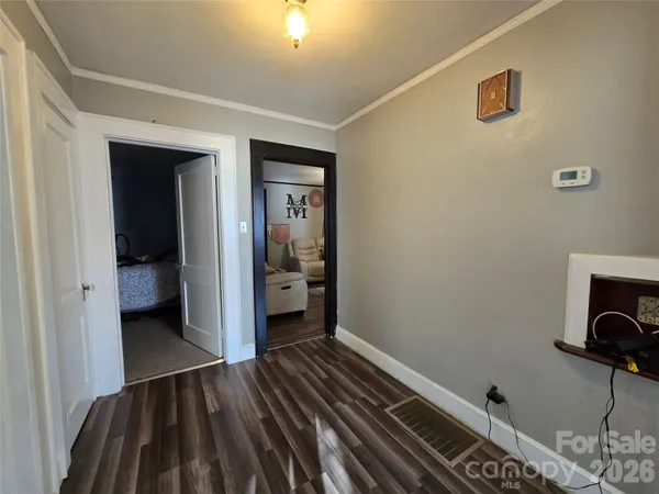 a bathroom with a sink toilet and mirror