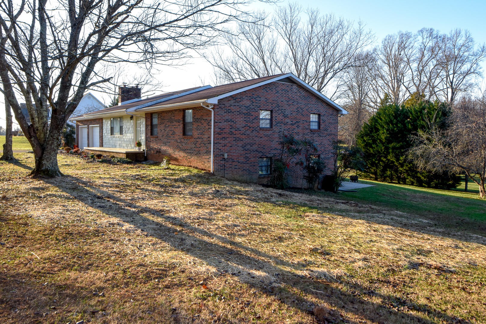 4607 Morganton Road Maryville, TN 37801 - Photo 3 of 38 a view of a house with a yard covered in snow