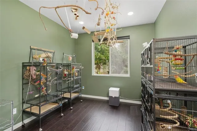 a view of a livingroom with furniture and hardwood floor