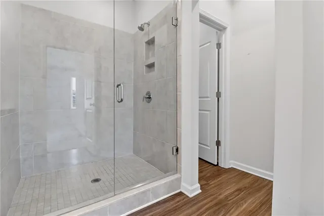 a view of a street with a building in the background