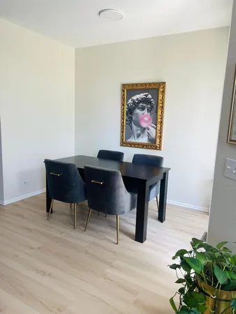 a view of a workspace with furniture