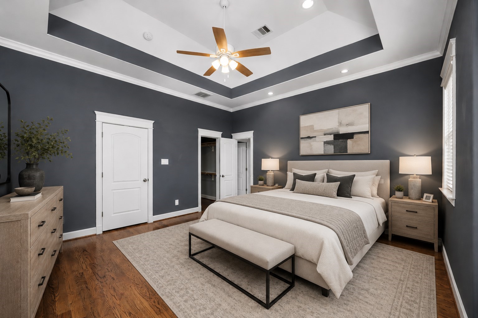 619 Rutland Street, Unit B Houston, TX 77007 - Photo 3 of 33 a spacious bedroom with a bed and a chandelier
