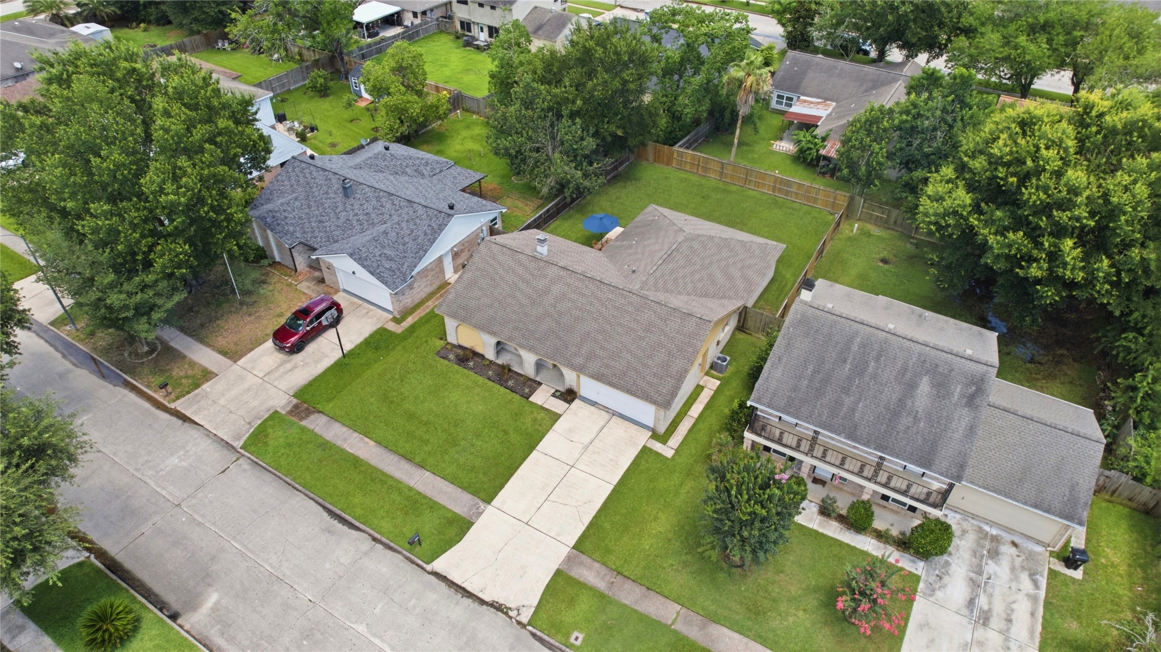 4019 Postwood Drive Spring, TX 77388 - Photo 41 of 50 an aerial view of a house with garden space and street view