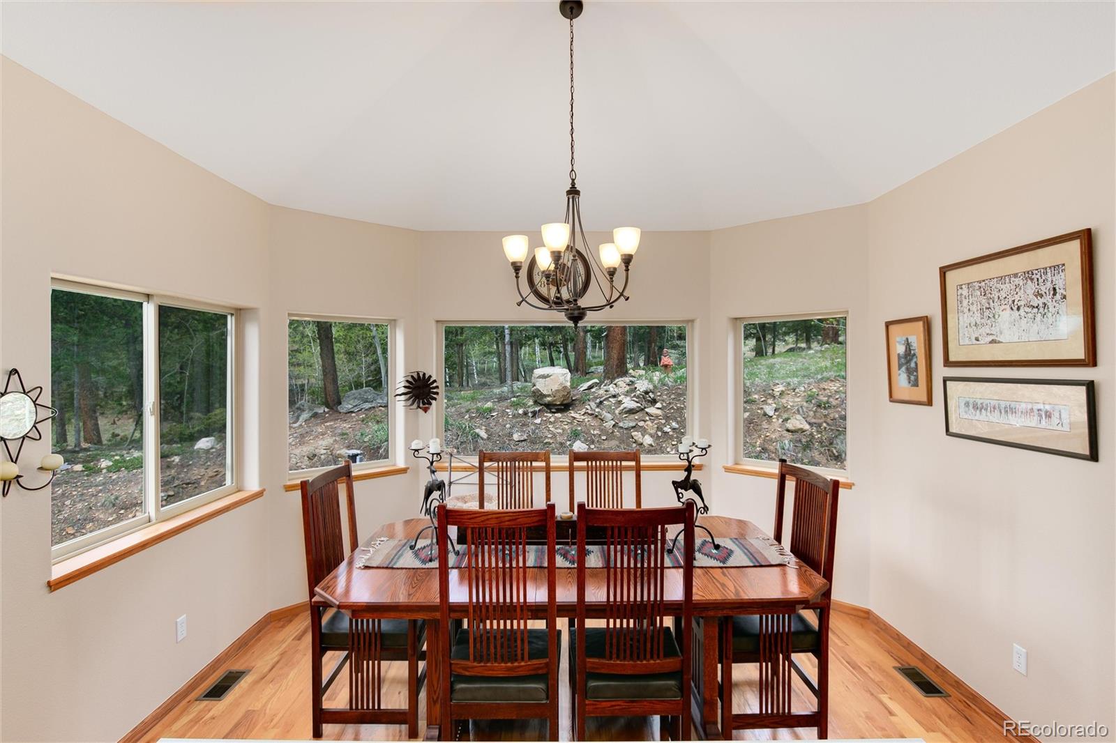 1211 Hughesville Road Black Hawk, CO 80422 - Photo 15 of 39 a view of a dining room with furniture window and outside view