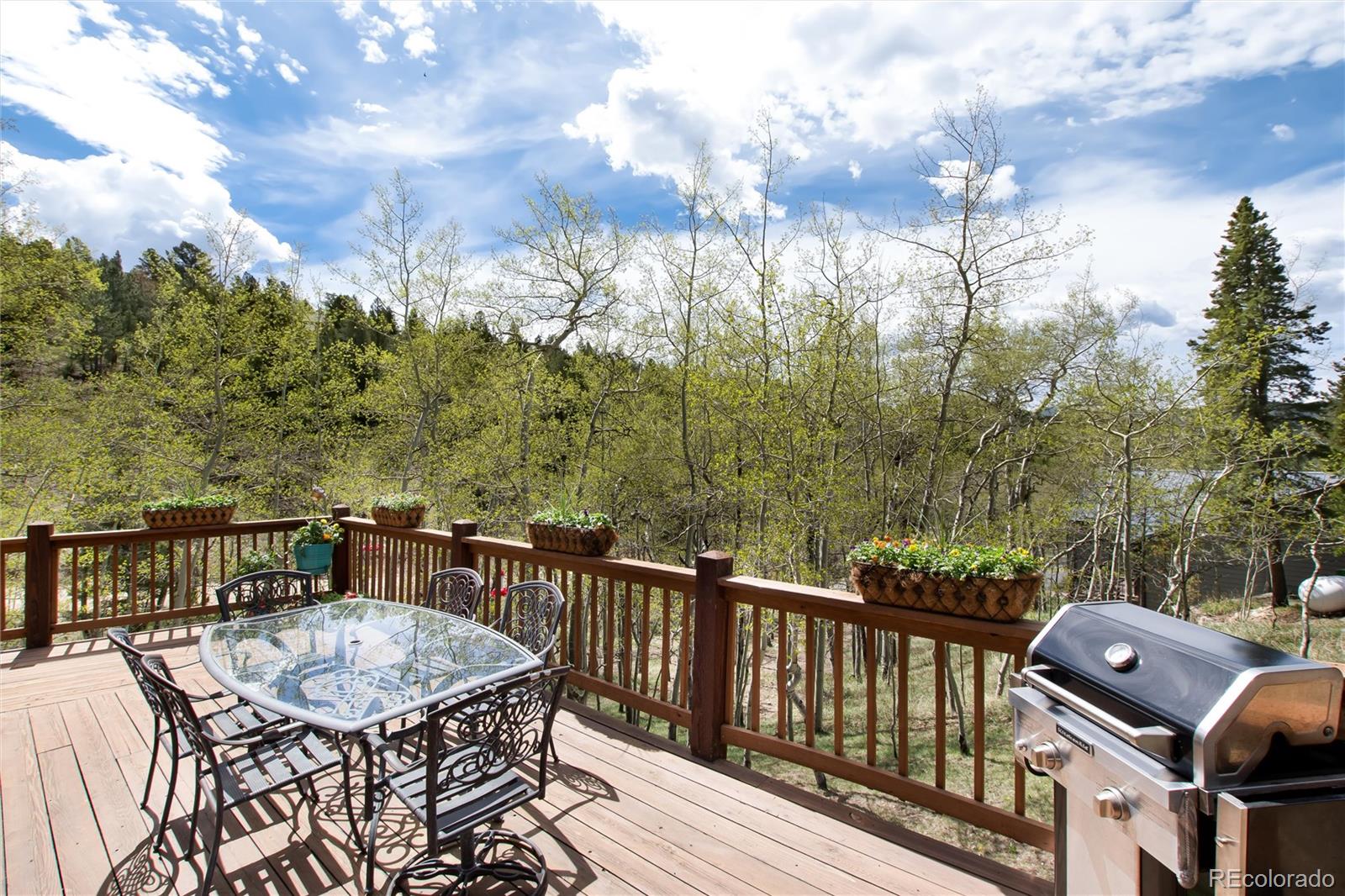 1211 Hughesville Road Black Hawk, CO 80422 - Photo 31 of 39 a view of a balcony with furniture