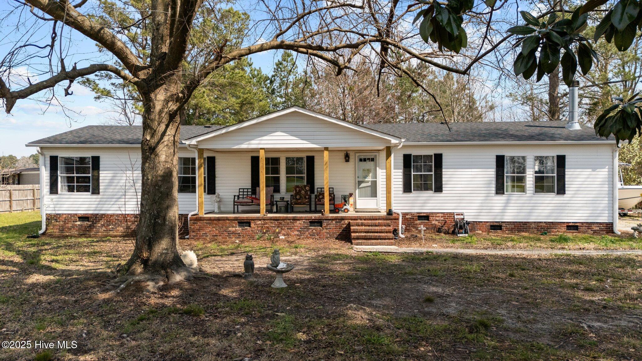 7507 Peacock Road Chadbourn, NC 28431 - Photo 1 of 34 1-web-or-mls-DJI_20250314150526_0425_D