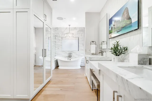 a view of a dresser with wooden floor