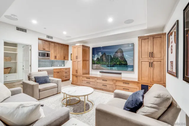 a utility room with sink dryer and washer