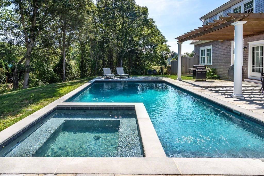 6 Nora's Lane Edgartown, MA 02539 - Photo 28 of 30 a view of swimming pool with chairs