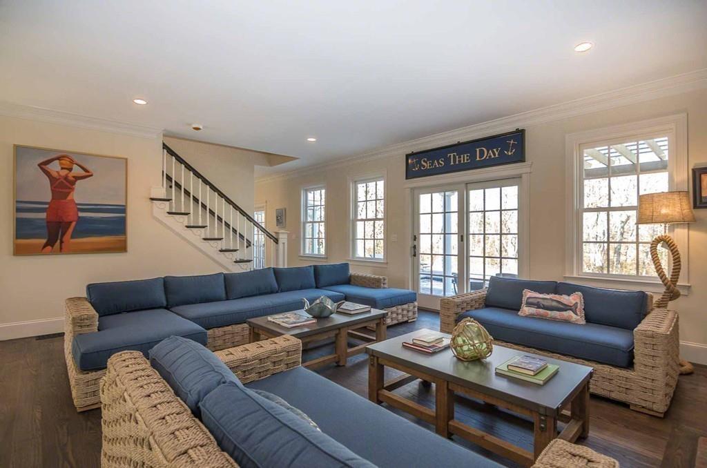 6 Nora's Lane Edgartown, MA 02539 - Photo 6 of 30 a living room with furniture and a large window