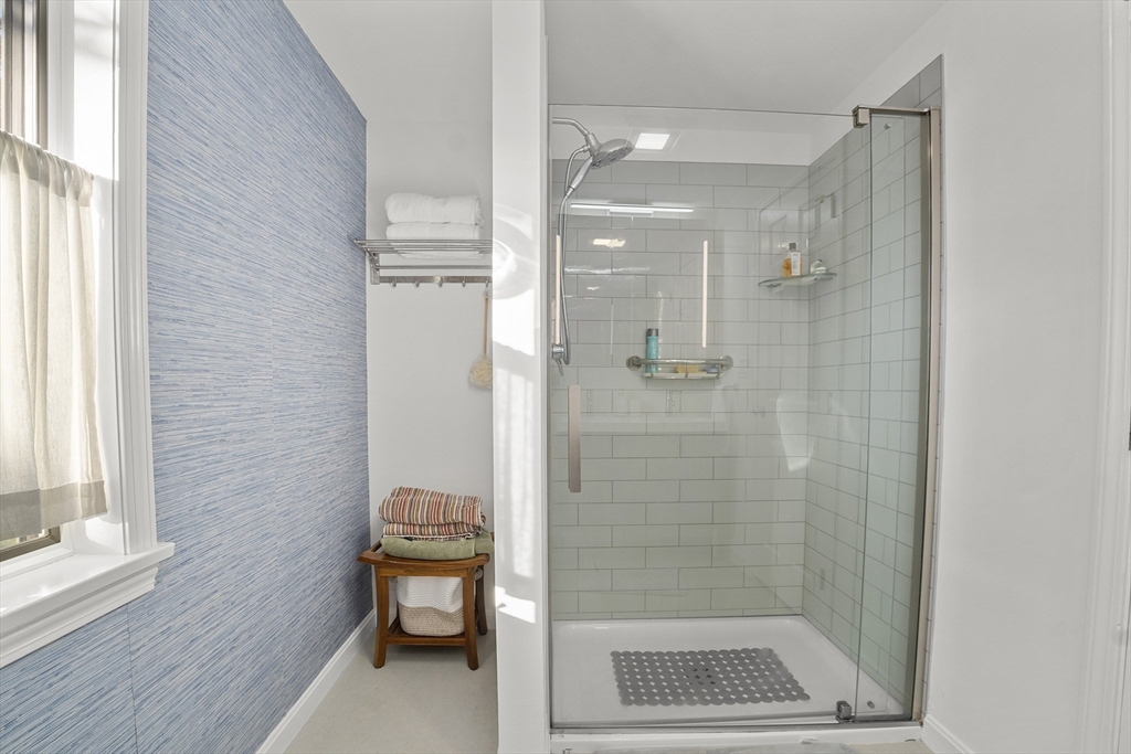 26 Quarry Ridge Lane, Unit 26 Rockport, MA 01966 - Photo 22 of 37 a bathroom with a shower