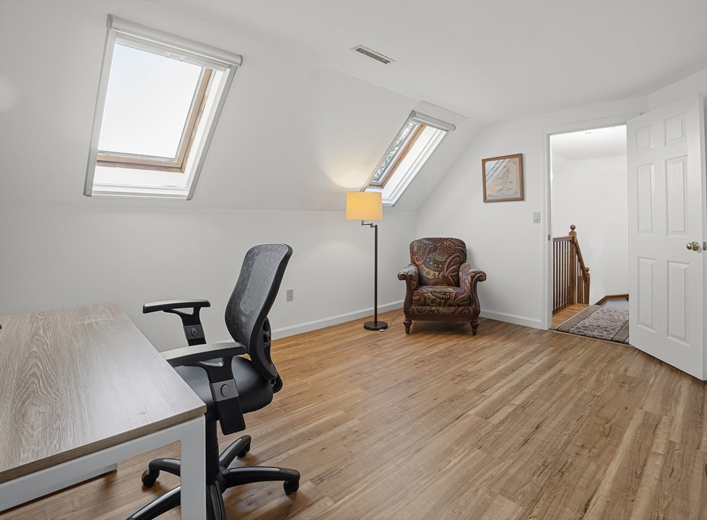 26 Quarry Ridge Lane, Unit 26 Rockport, MA 01966 - Photo 23 of 37 a view of workspace with wooden floor windows