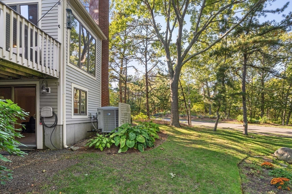26 Quarry Ridge Lane, Unit 26 Rockport, MA 01966 - Photo 34 of 37 a view of a house with a garden