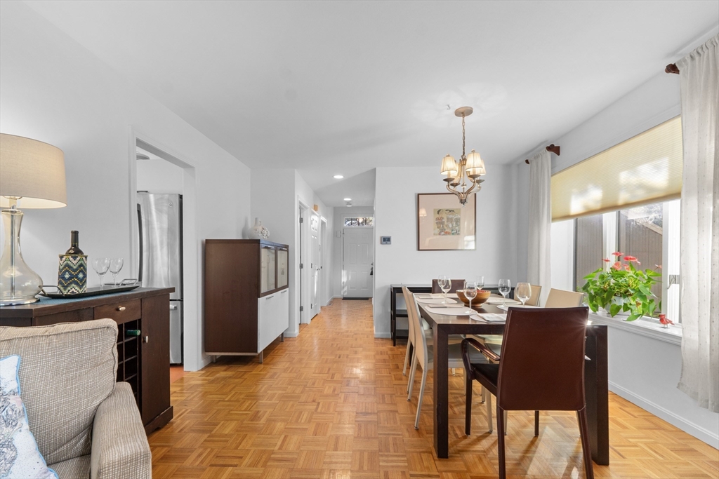 26 Quarry Ridge Lane, Unit 26 Rockport, MA 01966 - Photo 6 of 37 a dining room with furniture and window