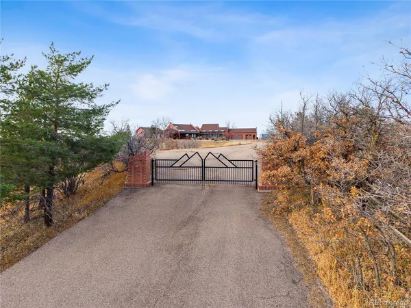 a view of a road with a building in the background