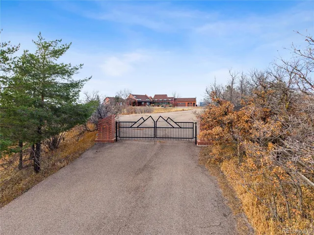a view of a road with a building in the background