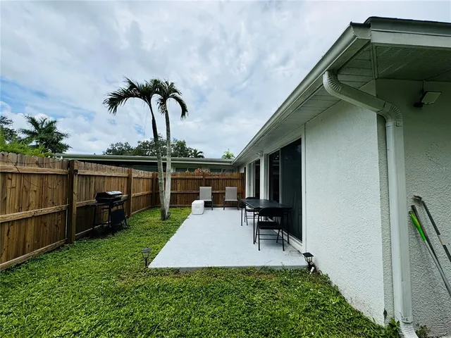a view of a chairs and table on the terrace