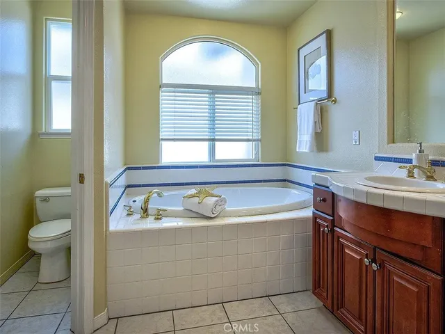 a bathroom with a sink a toilet and a bathtub