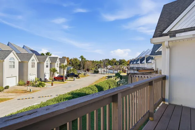 a view of a street from a balcony