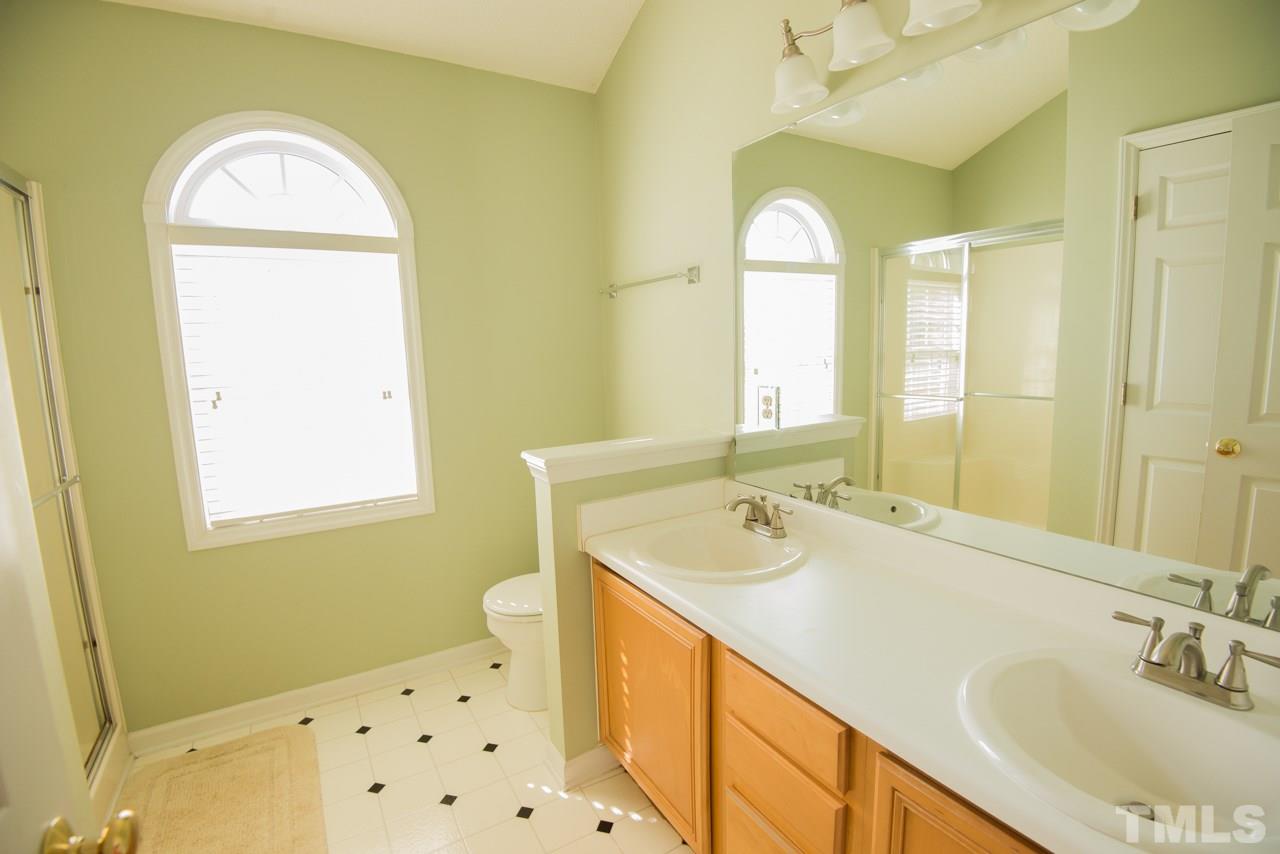 1303 Red Twig Road Apex, NC 27502 - Photo 14 of 27 Plenty of room to get ready in this master bathroom