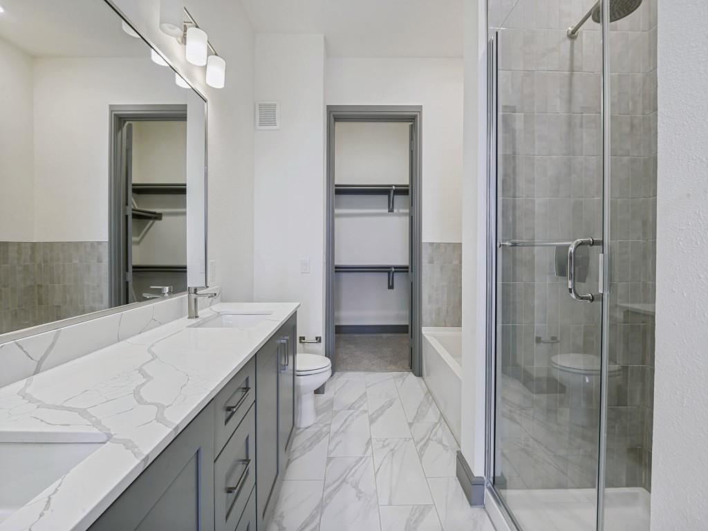 2700 Old Denton Road, Unit 4427 Carrollton, TX 75007 - Photo 15 of 25 a bathroom with a sink and a mirror