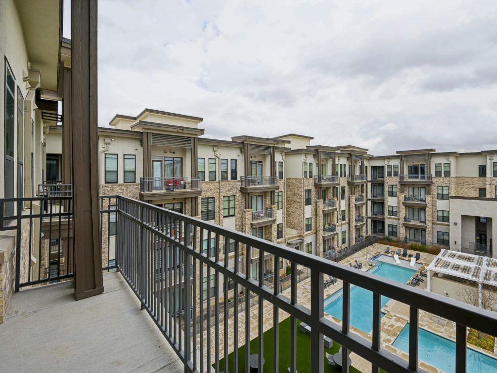 2700 Old Denton Road, Unit 4427 Carrollton, TX 75007 - Photo 18 of 25 a view of a city from a balcony