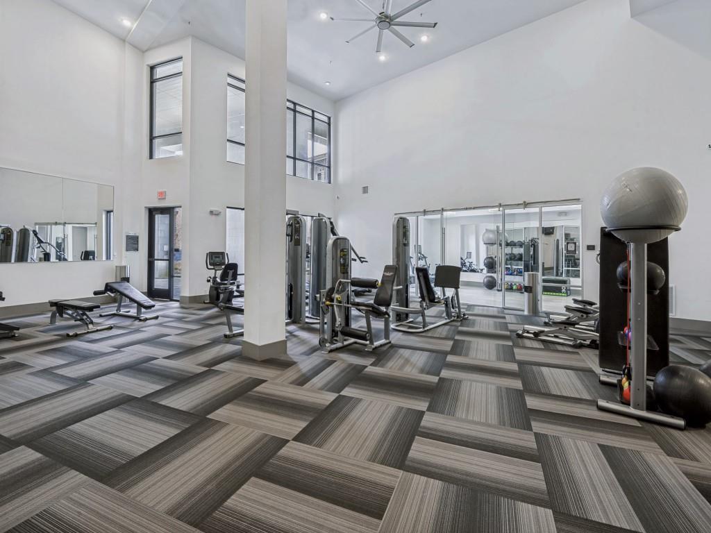 2700 Old Denton Road, Unit 4427 Carrollton, TX 75007 - Photo 22 of 25 a view of a living room and dining room