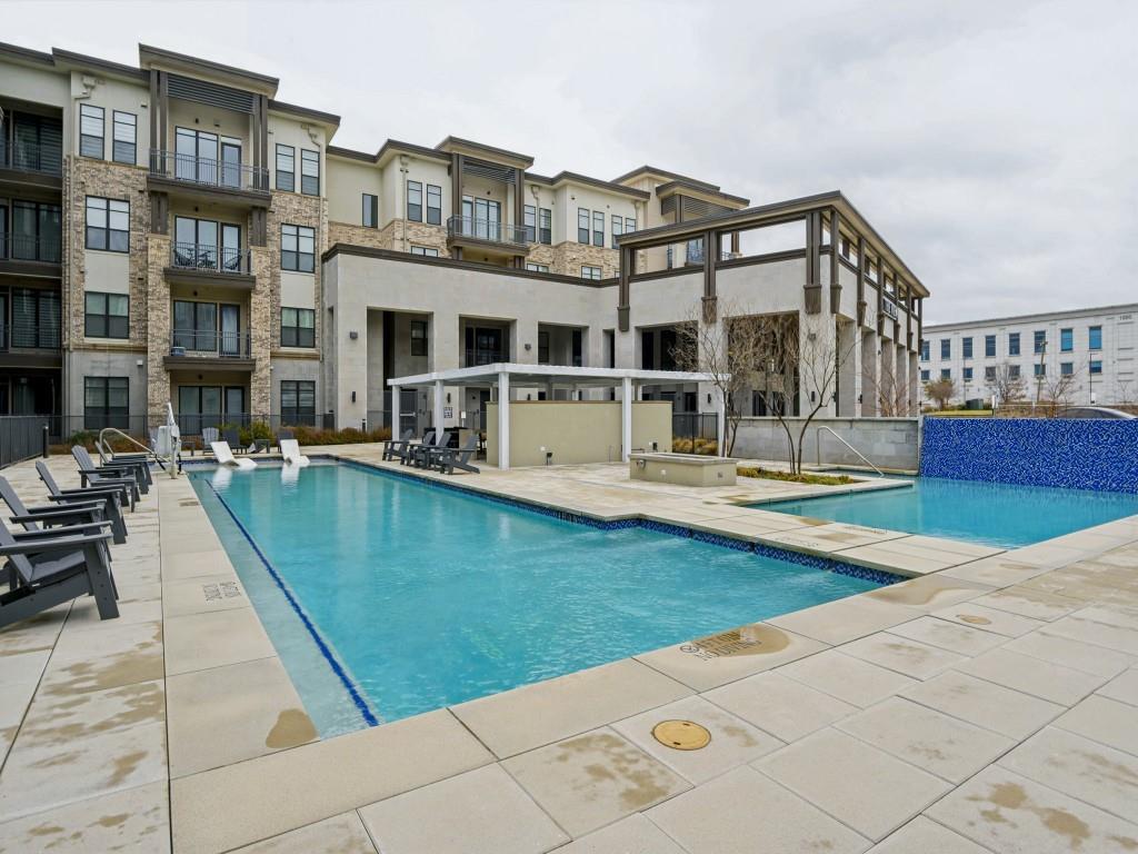 2700 Old Denton Road, Unit 4427 Carrollton, TX 75007 - Photo 24 of 25 a view of a house with pool and sitting area