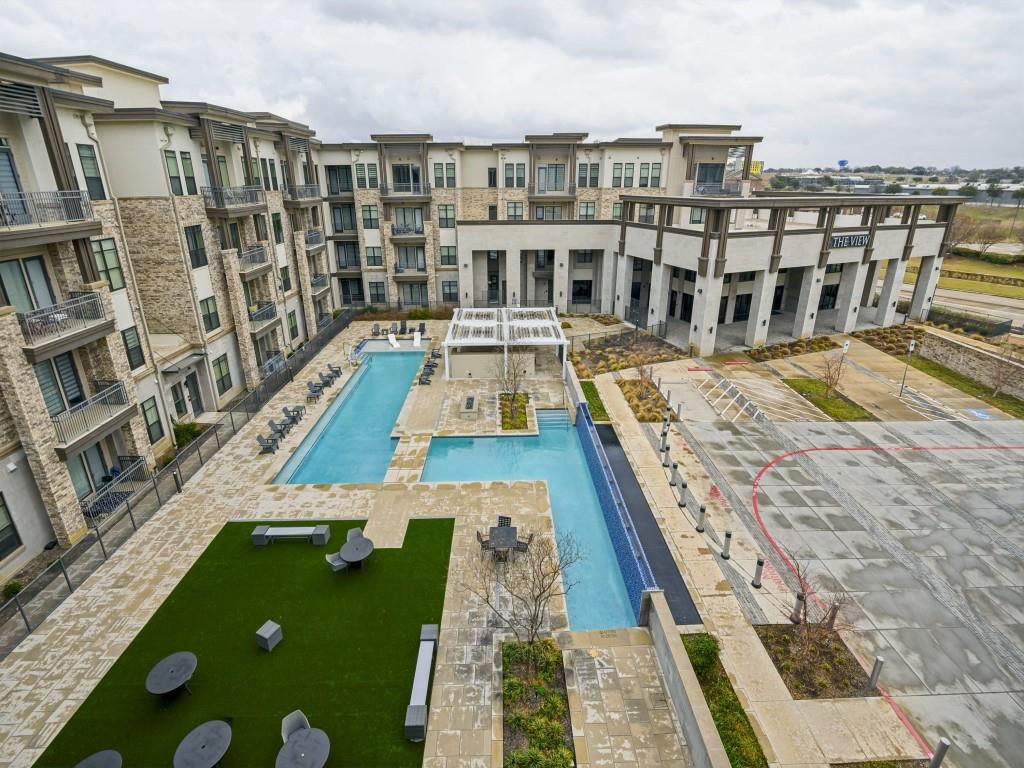 2700 Old Denton Road, Unit 4427 Carrollton, TX 75007 - Photo 25 of 25 a view of residential houses with yard