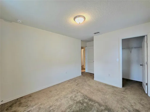 a view of a street with a house